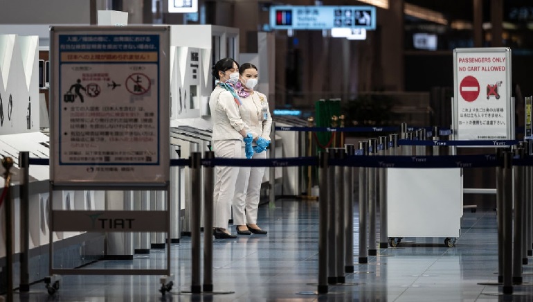 Japan bars all new foreign visitors for protection from Omicron