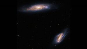 Hubble Space Telescope Photographs Two-Spiral Galaxies 275 Million Light-Years Away