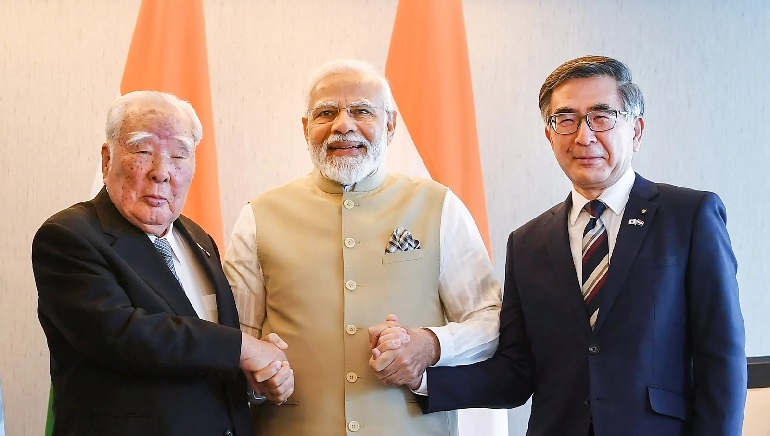 PM Modi meets leaders of SoftBank, Suzuki