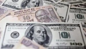 Indian Rupee To Rise Modestly Against Dollar In Next Three Months