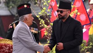 Nepal swears in ex-rapper as new prime minister